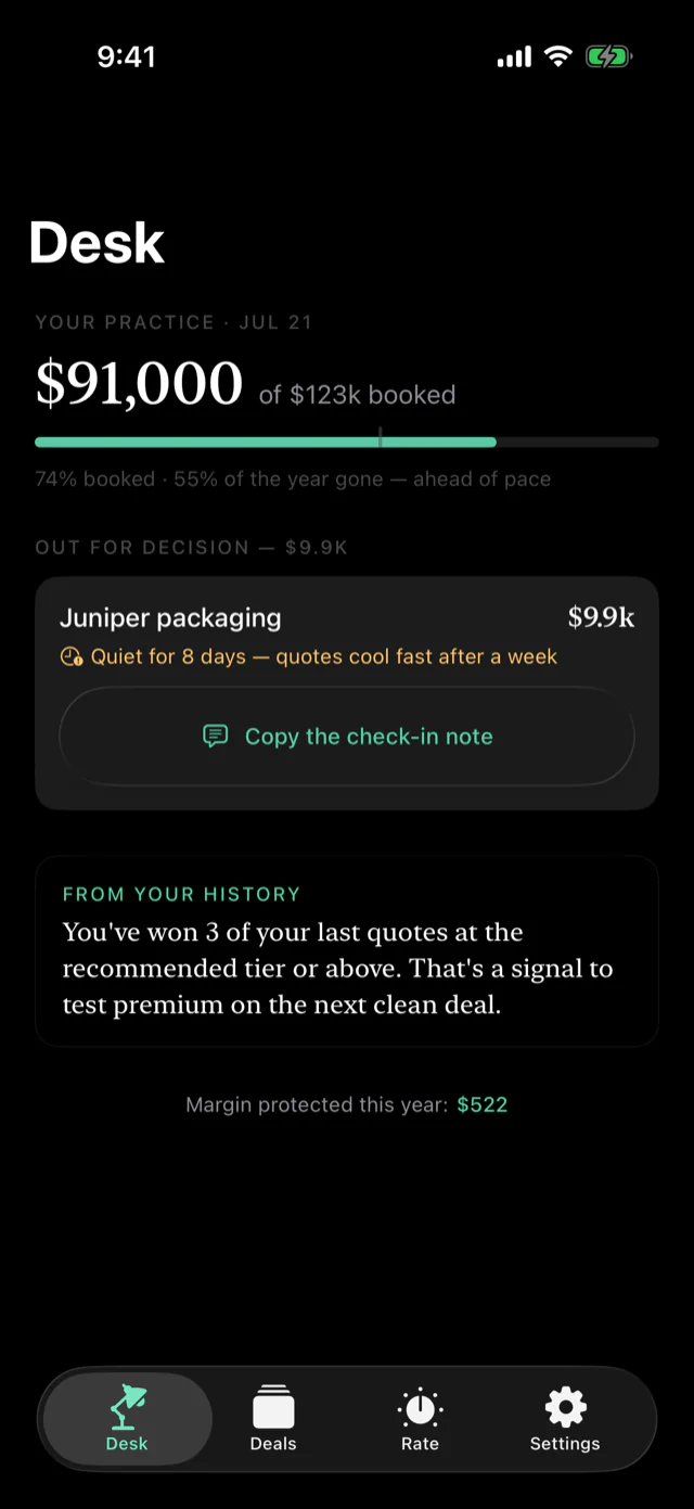 The Desk: income pacing against a goal, a quote out for decision, and a note from your own history